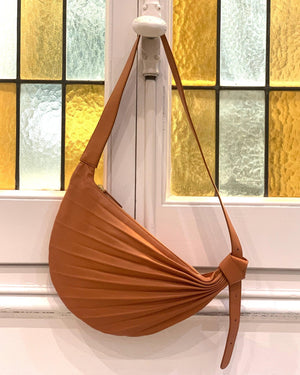 Sabrina Zeng's Chiaroscuro Hammock Sling Bag Camel - Designer Brown Hobo Bag