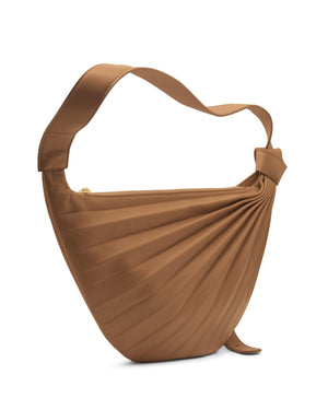 Sabrina Zeng's Chiaroscuro Hammock Sling Bag in Tan - Designer Tan Crossbody Leather Bag